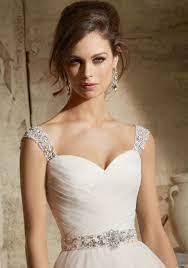 Tulle Bridal Ball Dress Features An Asymmetrically Draped Sweetheart Bodice And Full A Line Skirt Detachable Wedding Dresses Lace Bridal Dresses Bridal Gowns