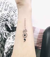 Semicolon tattoos are cropping up everywhere: 32 Empowering Semicolon Tattoos To Carry On The Hope Of Life Unalome Tattoo Wrist Tattoos For Women Tattoos For Women Small