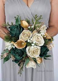 Whether it's adding some natural greens to the steps, the tables, or to the walls or adding some sage tones or emerald shades to the ceremony or reception sites, there are a lot of romantic and stylish ways to weave this theme into the wedding. Israel Collection 202073 40 310 Green Wedding Flowers Green Gold Weddings Green Themed Wedding