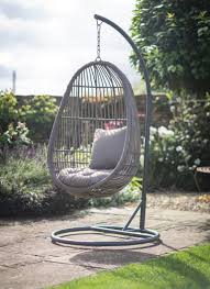 Our All Weather Rattan Hanging Nest Chair Comes With Its Own Stand Allowing You To Relax Anyw Rattan Garden Furniture Contemporary Garden Furniture Nest Chair