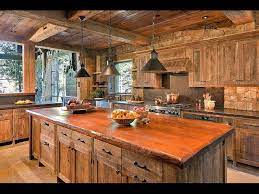 On the side, three drawers with recessed handles and wooden inlays offer tons of room for serverware, linens, and other personal items. Reclaimed Wood Kitchen Cabinet Doors Ideas Youtube