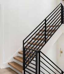 Metal Railing Staircase Metal Railing The Staircase Features White Oak Treads And A Custom Black Steel Modern Stair Railing Staircase Metal Staircase Railings