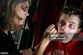 Shawn Poirier, who calls himself a witch, listens to Sue Larkin as... News  Photo