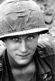 June 18, 1965 — One soldier. One message. One moment frozen in time. Larry  Wayne Chaffin of the 173rd Airborne Brigade stands guard at Phouc Vinh  airstrip, Vietnam. His helmet bears the