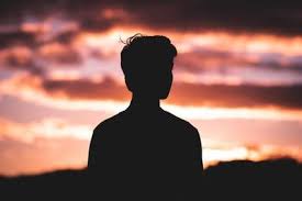 1920x1080 boy standing under tree at sunset wallpaper hintergrund bild. Silhouette Photography Of Man Standing In Front Of Red Sky Silhouette Photography Silouette Photography Silhoutte Photography