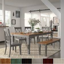 Luxurious dining room is beautifully appointed with a waterfall crystal chandelier hung over a french lacquered dining table surrounded by taupe velvet dining chairs placed on a gray hexagon rug. Overstock Com Online Shopping Bedding Furniture Electronics Jewelry Clothing More Grey Dining Tables Rectangular Dining Set Black Dining Room Furniture