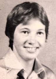 ASSISTS THE JOLLY ELF by Dave Millea Enterprise News (Cutline) BUSY WRITING  THOSE LETTERS