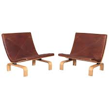 Sourcing authentic design and vintage furniture from leading designers and brands. Pair Of Poul Kjaerholm Pk 27 Easy Chairs For Sale At 1stdibs