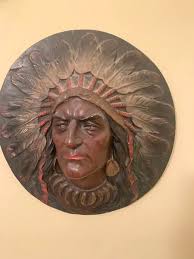 Totem poles and napkin holder carved by family member