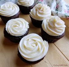 Chocolate Cupcakes With Sweetened Condensed Milk Buttercream Piped In Rosettes And Ruffles Condensed Milk Recipes Dessert Frosting Milk Recipes