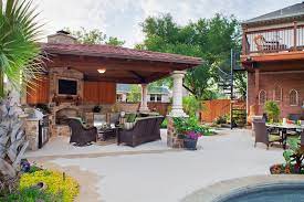 Porches and patios & pools. An Outdoor Oasis In Austin That Is Seamless In Design And Function Austin Decks Pergolas Covered Patios Porches More