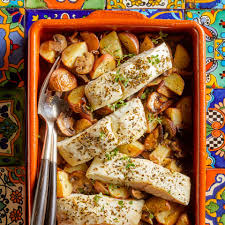 Provencal Baked Fish With Roasted Potatoes Mushrooms Recipe Eatingwell Baked Fish Mediterranean Diet Recipes Recipes