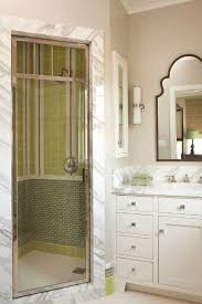 A beautiful ensuite bathroom with custom double vanity and oval shaving cabinets. Marble Shower Door Trim Houzz Com Stylish Bathroom Bathroom Design Traditional Bathroom