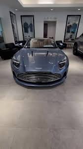 Image result for Concours Blue 2012 Aston Martin