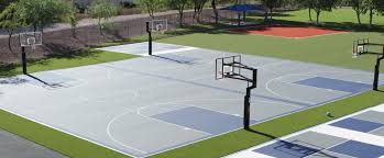 Greatmats' outdoor basketball court tiles are fully color saturated, so they will not fade over time. Versacourt Commercial Basketball Courts Multi Sport Game Court Surfaces