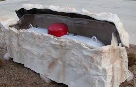 This propane tank holder is a convenient way to tuck away the propane tank from view. A Master Of Disguise How To Conceal Your Propane Tank Gastec