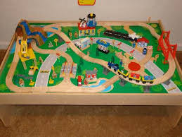 Cars, trains, planes, signs, trees, people, construction equipment, town buildings waterfall mountain piece to drive trains over and through kidkraft wooden train/table is compatible with thomas trains and brio tracks and train. Kidkraft Waterfall Mountain Train Set And Table Walmart Formemosmundoyaoi