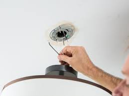 Remove the cover on the light. How To Change A Light Fixture Hgtv