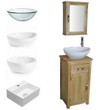 Kassen recommends being more creative in powder rooms, where storage and countertop space is not as necessary. Solid Oak Bathroom Cabinet Small Bathroom Vanity Units Mirror Bathroom Sink Ebay
