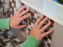 I suggest going top to bottom, right to left. How To Install A Backsplash How Tos Diy
