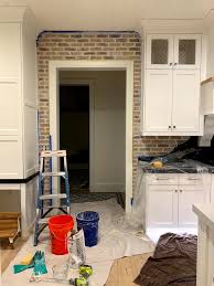 To make the brick look more realistic, you can paint over it and even add a. Brick Backsplash Diy Kitchen Renovation With German Schmear