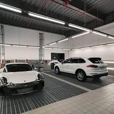 Lighting Project For Porsche Showroom Ip65 Led Linear Light Or Ip65 Led Batten Light Porsche Showroom Garage Design Car Workshop