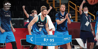 Germany's niels giffey (5), left, and slovenia's luka doncic (77) fight for a loose ball during men's basketball quarterfinal game at the 2020 summer olympics, tuesday, aug. Wk6lafhdezuzvm