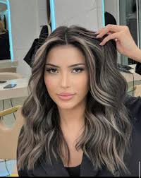 Who is a highly recommended hair colorist in Leander for ash blonde  highlights?