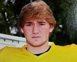 Coventry community gathers to remember football player