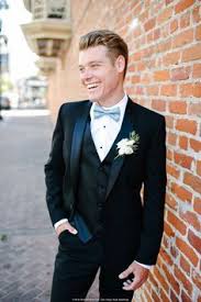 Lighten Up The Look Of The Classic Black Tuxedo With A Light Blue Bow Tie Photography Mr And Mrs Wedd Blue Prom Tux Blue Bow Tie Wedding Black Suit Bow Tie