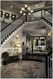 Often the exterior of a black house is a different these types of homes are ideal for locations where the black will add to the drama of a landscape, or help the house blend with its surroundings. Black And White Entryway Decor Ideas You Ll Fall In Love