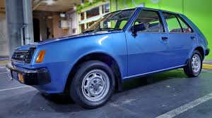 Image result for Bright Yellow 1980 Colt