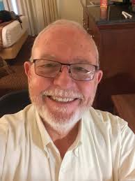 This is a photo of the ground breaking for the new Mother of Sorrows church  that we all know today. The priest in the wheel chair is Father Daniel  O'Rourke the former