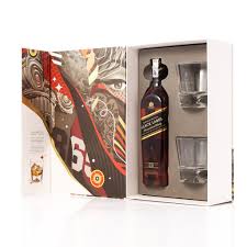 Johnnie walker red label was launched in its current form by brothers george and alexander walker in 1909, though it had existed as walker's special old highland red label for some years previously. Johnnie Walker Black Label Gift Set Trisan Eaton Artist Series The Whisky Shop Singapore
