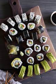A friend of mine is having a few people over tomorrow night (about 8 people) and she's serving temaki sushi (hand rolls) which we will each roll to our liking (she will prepare fish, veggies, etc as well as the rice for guests to make their rolls). Homemade Veggie Sushi Wife Mama Foodie