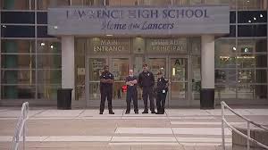Rally held to end violence at Lawrence High School