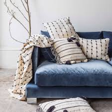 sinking into this blue velvet sofa