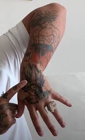 Anuel aa has several tattoos on his right arm. Untold Stories And Meanings Behind Anuel Aa S Tattoos Tattoo Me Now