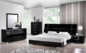 A black room is part of a communication center (e.g. Hailey Black Bedroom Set Global Furniture 5pc