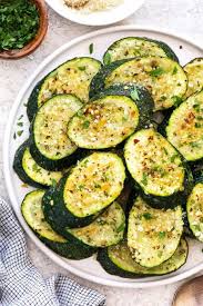 Add the zucchini, squash, italian seasoning and a generous pinch of salt. Herb Roasted Zucchini With Parmesan Jessica Gavin