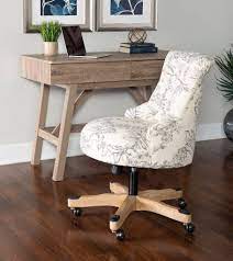 Choose an office chair that looks similar to a wingback chair, or choose a chair with a classic wood swivel built to impress, an office chair with leather rolled arms and plush back and seat cushioning. Sinclair Floral Office Chair Linon Oc106fl01