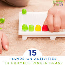 Try these kindergarten hand exercises to help develop your child's fine motor skills and get them ready for handwriting! 15 Hands On Activities To Promote Pincer Grasp With Kids