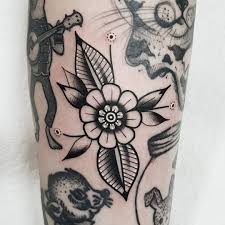 Small, simple and bold traditional tattoo filler designs are always a fun option as you can literally choose anything that fills those last odd shaped spaces; Gap Filler Flower By Rabtattoo Tattoogrid Net