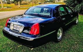 Image result for Charcoal Green 1999 Town Car