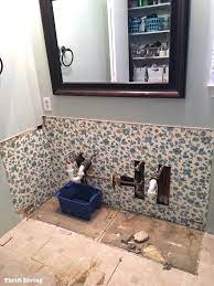 Give a fresh new look to an old vanity with a little paint and some elbow grease. How To Remove An Old Bathroom Vanity Thrift Diving Blog