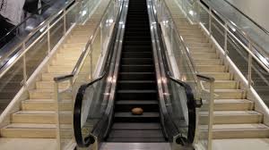 The steps run on tracks. Yes Ham Goes Up An Escalator Youtube