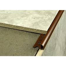 .edge tile trim is an extruded round edge pvc tile trim for giving a protective and neat finish to tiled corners and edges in bathrooms and other tiled available in 6mm, 8mm, 10mm and 12mm internal heights. Round Edge Pvc 12mm Brown 2 5m Length Kirk Marketing