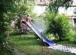 Wasserrutsche Im Garten Und Kein Planschbecken Wasserrutsche Garten Wasserrutsche Gartengestaltung