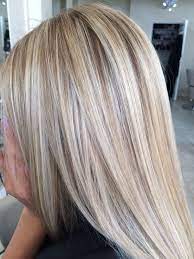 Instead of trying to make your blonde hair blonder with highlights, consider toning things down with lowlights. Highlights And Lowlights Blonde Hair With Highlights Ash Blonde Hair With Highlights Hair Color Highlights