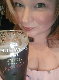 Sat outside the pub having a cold pint